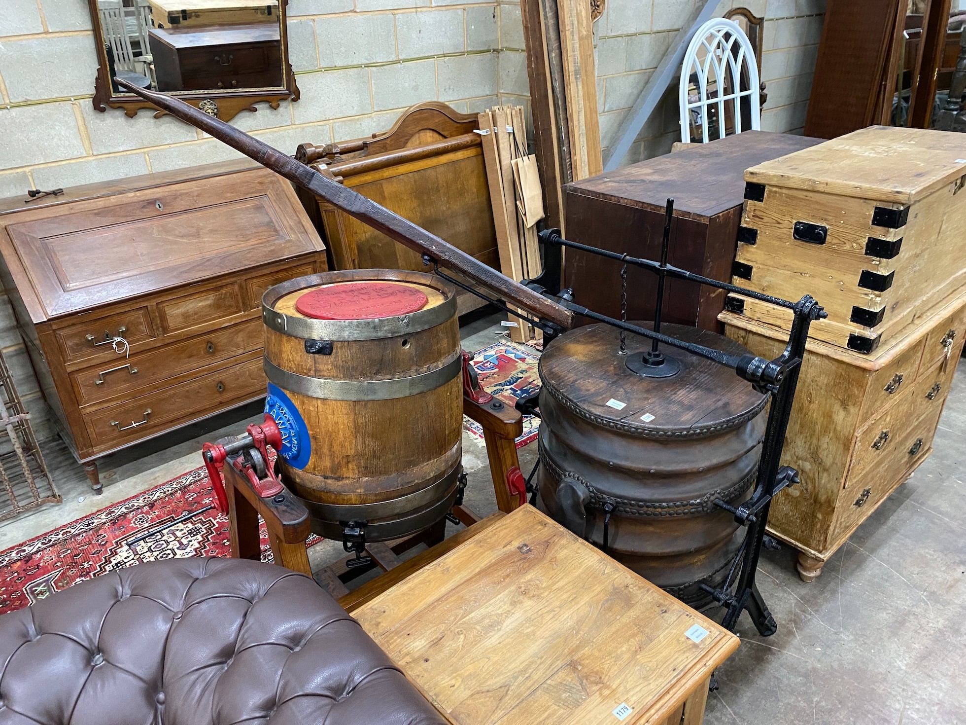 An 19th century cast iron oak and leather blacksmiths bellows by Linley and Son, Sheffield height 136cm.